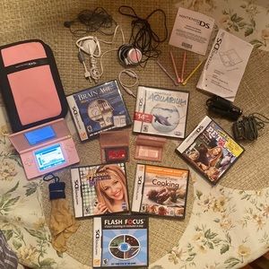 Nintendo DS Lite Console with 7 DS Games 1 GB.  All like new.